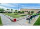 Bocce ball court with manicured landscaping, seating, and well-maintained playing surfaces at 9645 W Kimberly Way, Peoria, AZ 85382