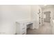 Hallway niche with small built-in desk and view into bedroom with shutters at 122 W Cottage Ln, Tempe, AZ 85282