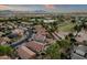 Expansive aerial view of a neighborhood showcasing desert landscaping and nearby mountain views at 20848 E Desert Hills Blvd, Queen Creek, AZ 85142