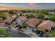 Bird's eye view of a residential neighborhood, featuring manicured lawns and orderly street patterns at 20848 E Desert Hills Blvd, Queen Creek, AZ 85142