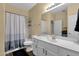 Bright bathroom featuring a vanity with sink, shower-tub combination, and neutral decor at 20848 E Desert Hills Blvd, Queen Creek, AZ 85142