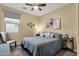 Cozy bedroom featuring a ceiling fan and comfortable furnishings for a relaxing ambiance at 20848 E Desert Hills Blvd, Queen Creek, AZ 85142
