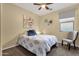 Welcoming bedroom with soothing decor, ceiling fan, and comfortable furnishings for restful nights at 20848 E Desert Hills Blvd, Queen Creek, AZ 85142