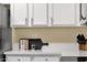 Countertop features white quartz countertops, stainless appliances, and ample cabinet space at 20848 E Desert Hills Blvd, Queen Creek, AZ 85142