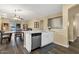 Kitchen with stainless steel dishwasher and large island with seating at 20848 E Desert Hills Blvd, Queen Creek, AZ 85142