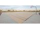 Outdoor basketball court with hoops and ample space for playing, ideal for residents to enjoy recreational activities at 26232 N 121St Ln, Peoria, AZ 85383
