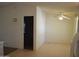 Well-lit living room showcasing neutral walls and bright flooring at 2650 W Union Hills Dr # 43, Phoenix, AZ 85027
