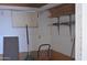 Storage room with pegboard wall, shelving, and ample space at 2650 W Union Hills Dr # 43, Phoenix, AZ 85027