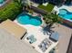 Gorgeous backyard featuring a sparkling pool, a hot tub, a grassy area, and an outdoor patio at 343 S Cottonwood St, Chandler, AZ 85225