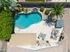 Relaxing backyard featuring a private pool, outdoor seating area, and a well-maintained yard at 343 S Cottonwood St, Chandler, AZ 85225