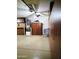 Tidy garage featuring epoxy flooring and custom built-in wood cabinets and storage at 343 S Cottonwood St, Chandler, AZ 85225