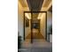 Grand entryway featuring modern decor and a glimpse into the home's stylish living spaces at 5311 E Mitchell Dr, Phoenix, AZ 85018