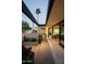 Inviting walkway with desert landscaping, leading to a modern home with an open design and stylish exterior accents at 5311 E Mitchell Dr, Phoenix, AZ 85018