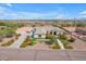 Stunning home boasts a desert-landscaped front yard, long driveway, and a charming façade at 5586 W Rock Ct, San Tan Valley, AZ 85144