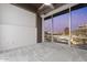 Serene bedroom with large windows showcasing city views, complemented by neutral paint and soft carpet at 1 E Lexington Ave # 1302, Phoenix, AZ 85012