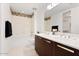 Spacious closet with built-in shelving and hanging rods at 1 E Lexington Ave # 1302, Phoenix, AZ 85012