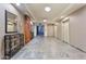 Hallway leading to elevators, adorned with elegant decor and modern lighting at 1 E Lexington Ave # 1302, Phoenix, AZ 85012