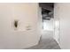 Bright hallway featuring modern decor, wood floors, and access to various rooms at 1 E Lexington Ave # 1302, Phoenix, AZ 85012