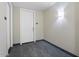 Hallway outside apartment with unit number, light fixture, and carpet at 1 E Lexington Ave # 1302, Phoenix, AZ 85012