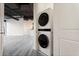 Laundry area with stacked washer and dryer at 1 E Lexington Ave # 1302, Phoenix, AZ 85012