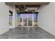 Open living area with cityscape views, featuring floor-to-ceiling windows and modern flooring at 1 E Lexington Ave # 1302, Phoenix, AZ 85012