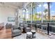 Bright lounge area featuring stylish decor, comfortable seating, and expansive windows with city views at 1 E Lexington Ave # 1302, Phoenix, AZ 85012