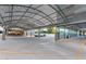 Covered parking garage with ample parking spaces and vehicle charging station at 1 E Lexington Ave # 1302, Phoenix, AZ 85012