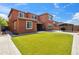 Large backyard with well-manicured artificial turf, a covered patio, and a gazebo at 12172 W Davis Ln, Avondale, AZ 85323