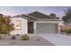 Charming single-story home with a two-car garage and neutral color palette at 12580 W Trumbull Rd, Avondale, AZ 85323