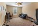 Bedroom with carpet floors, neutral walls and a futon couch at 13806 W Remuda Dr, Peoria, AZ 85383