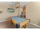 Game room featuring a billiards table, neutral walls, carpeted floor, and wall mounted TV at 13806 W Remuda Dr, Peoria, AZ 85383
