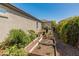 Charming garden with raised beds and a variety of plants, perfect for gardening enthusiasts at 13806 W Remuda Dr, Peoria, AZ 85383