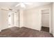 Bedroom featuring hardwood floors, and access to walk-in closet at 14154 W Yosemite Dr, Sun City West, AZ 85375
