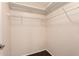 This closet features wire shelving and neutral walls for a tidy and organized storage space at 14154 W Yosemite Dr, Sun City West, AZ 85375