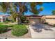 Charming single-Gathering home with mature landscaping, beautiful trees and a spacious two car garage at 14154 W Yosemite Dr, Sun City West, AZ 85375