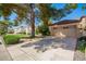 Charming single-Gathering home with mature landscaping, beautiful trees and a spacious two car garage at 14154 W Yosemite Dr, Sun City West, AZ 85375