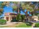 Charming single-Gathering home with mature landscaping, beautiful trees and a spacious two car garage at 14154 W Yosemite Dr, Sun City West, AZ 85375