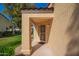 Charming front porch with decorative security door and updated tile at 14154 W Yosemite Dr, Sun City West, AZ 85375