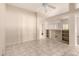 Inviting living room featuring tile floors and open views into other rooms at 14154 W Yosemite Dr, Sun City West, AZ 85375