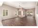 Spacious living room features wood floors, neutral paint, and plentiful natural light at 14154 W Yosemite Dr, Sun City West, AZ 85375