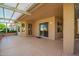 Charming covered patio perfect for outdoor relaxation with decorative tile flooring at 14154 W Yosemite Dr, Sun City West, AZ 85375