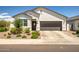 Charming single-story home featuring a two-car garage and welcoming front yard at 1482 W Gloucester W Rd, San Tan Valley, AZ 85143