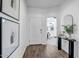 Inviting entryway with a console table, decor, and view of a living area at 1482 W Gloucester W Rd, San Tan Valley, AZ 85143