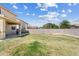 The spacious backyard includes a covered patio area, ideal for relaxing and enjoying the outdoors at 1518 W Crape Rd, San Tan Valley, AZ 85140