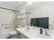 Bathroom featuring a double-sink vanity, tub and shower, and neutral walls at 1518 W Crape Rd, San Tan Valley, AZ 85140