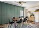 Bright dining area with a modern table, comfortable seating, and stylish decor, ideal for Gathering meals and gatherings at 1518 W Crape Rd, San Tan Valley, AZ 85140