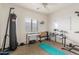 Dedicated workout area featuring equipment and ample space for exercise, promoting a healthy lifestyle at home at 1518 W Crape Rd, San Tan Valley, AZ 85140