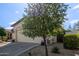 Attractive single-Gathering home featuring low maintenance landscaping and a spacious driveway at 15246 N 138Th Ln, Surprise, AZ 85379