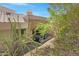 An exterior view of a patio area, showcasing outdoor living space with a grill at 16450 E Avenue Of The Fountain -- # 47, Fountain Hills, AZ 85268