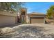 Charming single-story home with a three-car garage, beautiful landscaping, and a tile roof on a sunny day at 16450 E Avenue Of The Fountain -- # 47, Fountain Hills, AZ 85268